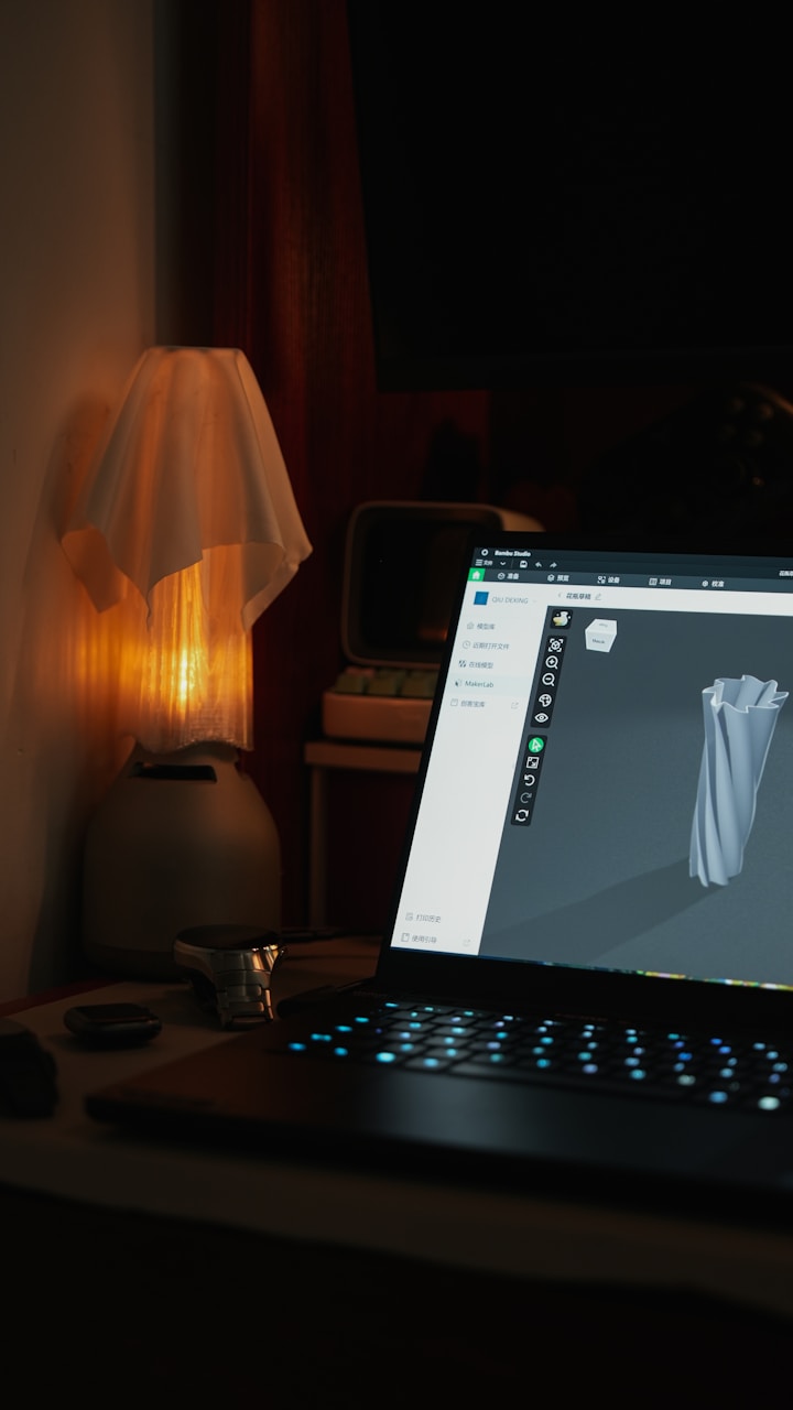 Laptop screen showing a 3D model during digital form development