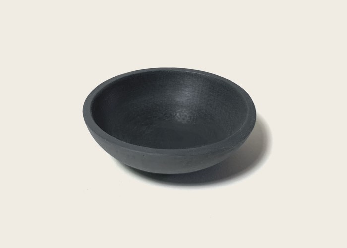 Toki bowl — a shallow bowl in matte charcoal algae bioplastic